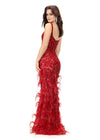 Back - Red ASHLEYlauren 11279 fitted gown featuring a deep illusion V-neckline, fully hand-beaded design, and feather accents throughout the skirt.