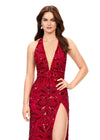 Red ASHLEYlauren 11283 halter gown featuring a V-neckline, open back, intricate beading throughout, and a left leg slit.