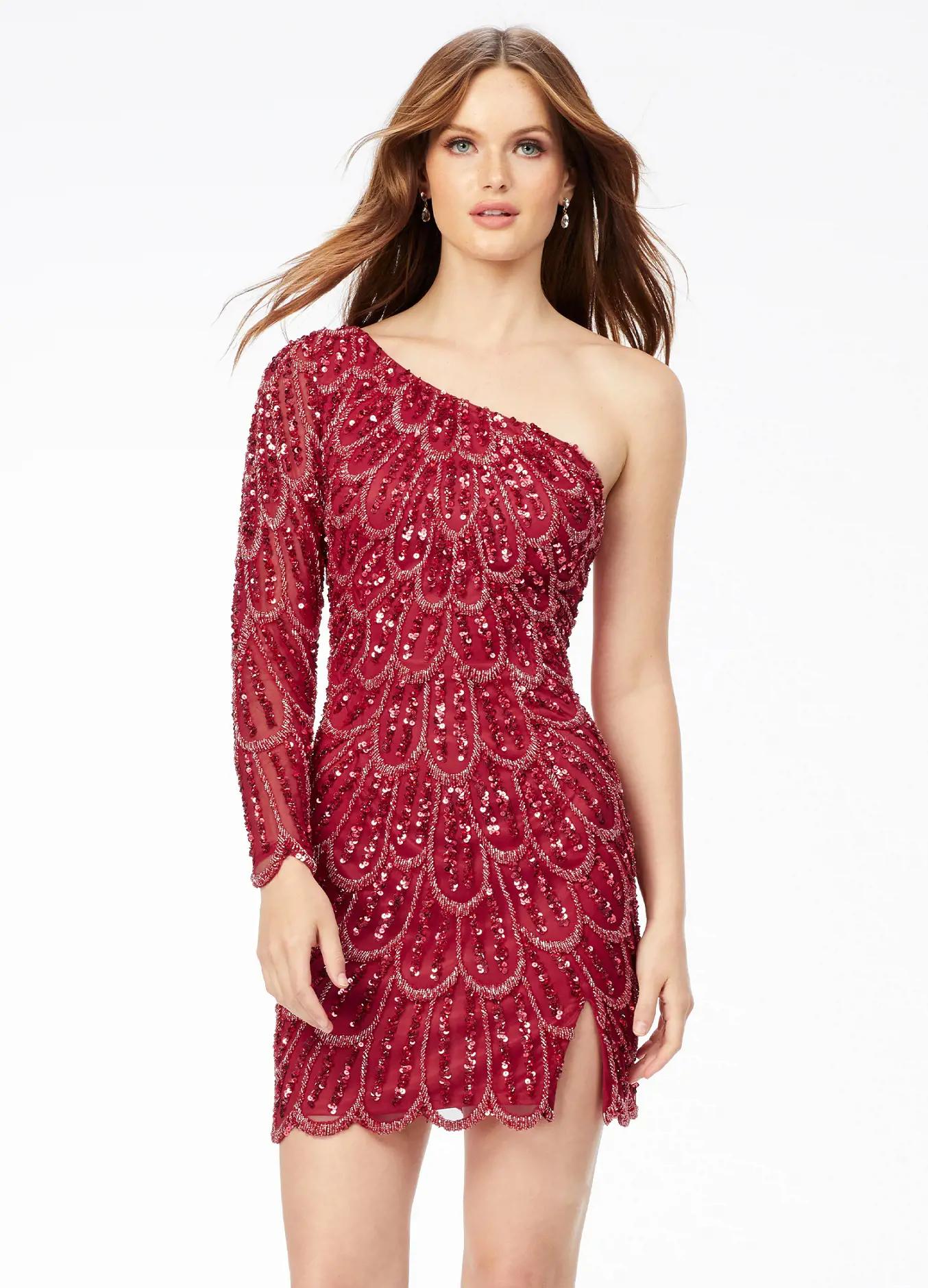 Red ASHLEYlauren 4498 fitted one shoulder cocktail dress featuring an intricate peacock-inspired sequin bead pattern, single sleeve, and a front left leg slit for a bold and elegant look.