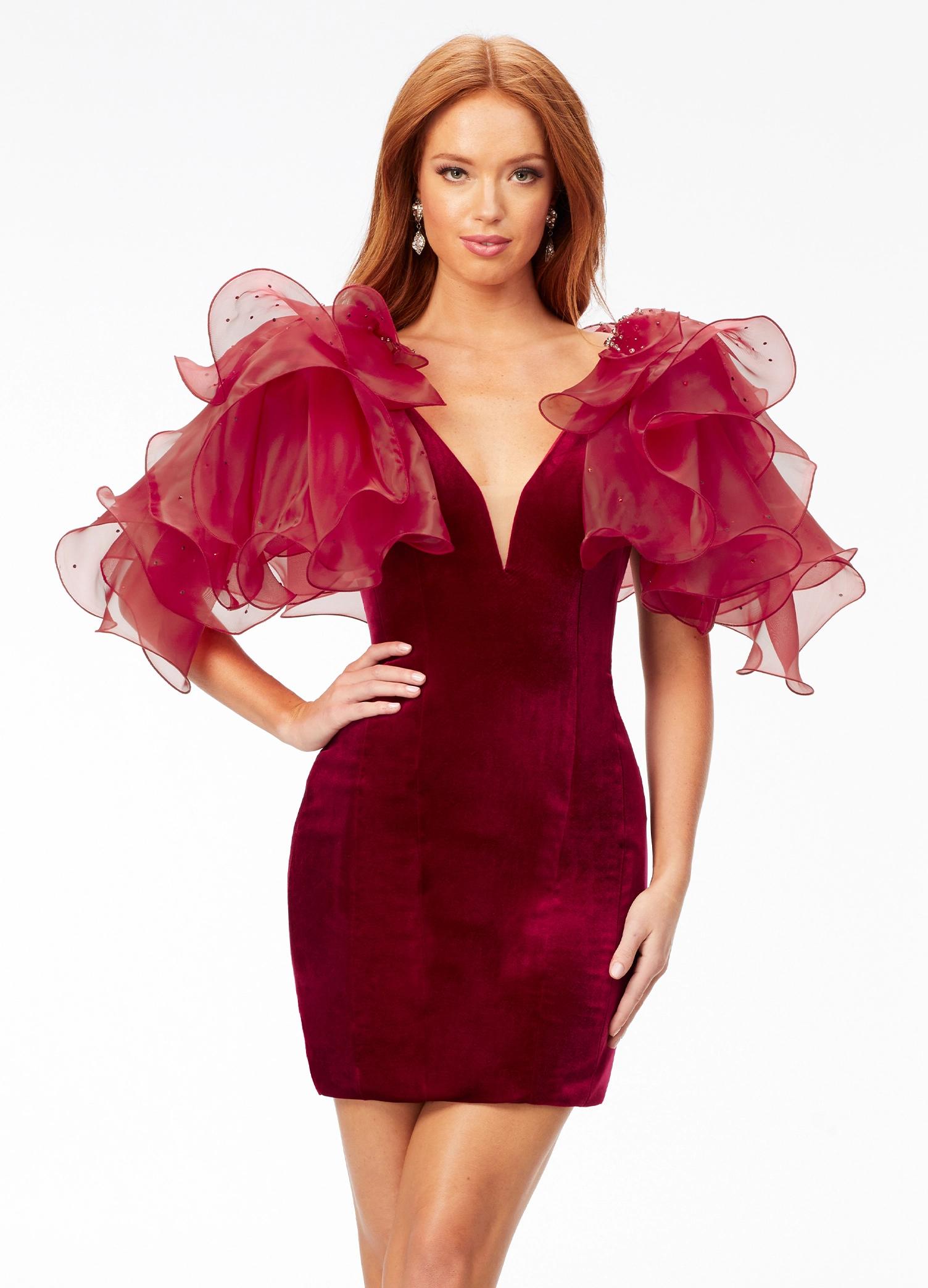 Red ASHLEYlauren 4529 fitted velvet cocktail dress featuring a V-neckline, V-back, multi-tiered organza ruffle details with scattered crystals, and contour seaming for a glamorous, curve-enhancing look.