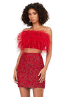 Red ASHLEYlauren 4599 – A stunning two-piece set featuring a strapless feather bustier and a fully beaded fitted skirt. This gorgeous, statement-making outfit is a must-have addition to your closet.