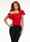 Red ASHLEYlauren 9001 elegant one shoulder bustier featuring asymmetrical ruching and delicate bow accents, perfect for styling with jeans or for pageant headshots.