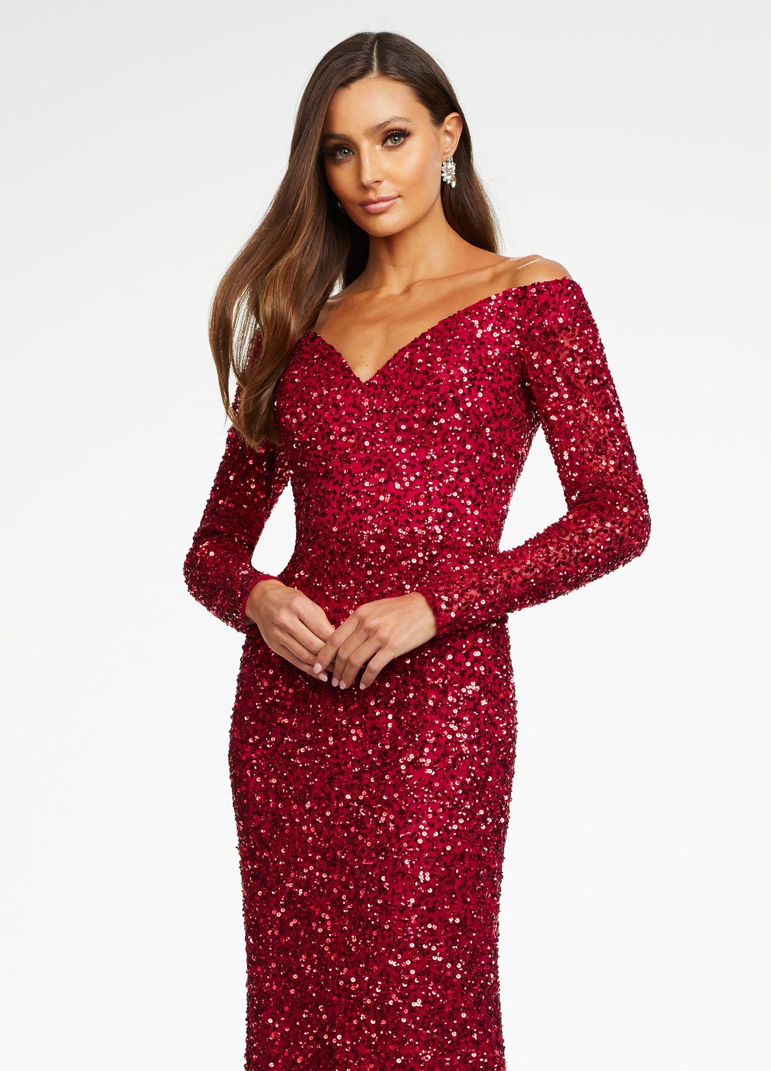 Ruby Red ASHLEYlauren 11176 off shoulder sequin gown featuring long sleeves, a fitted silhouette, an inner corset for added structure, and a sweeping train for a dramatic and glamorous look.