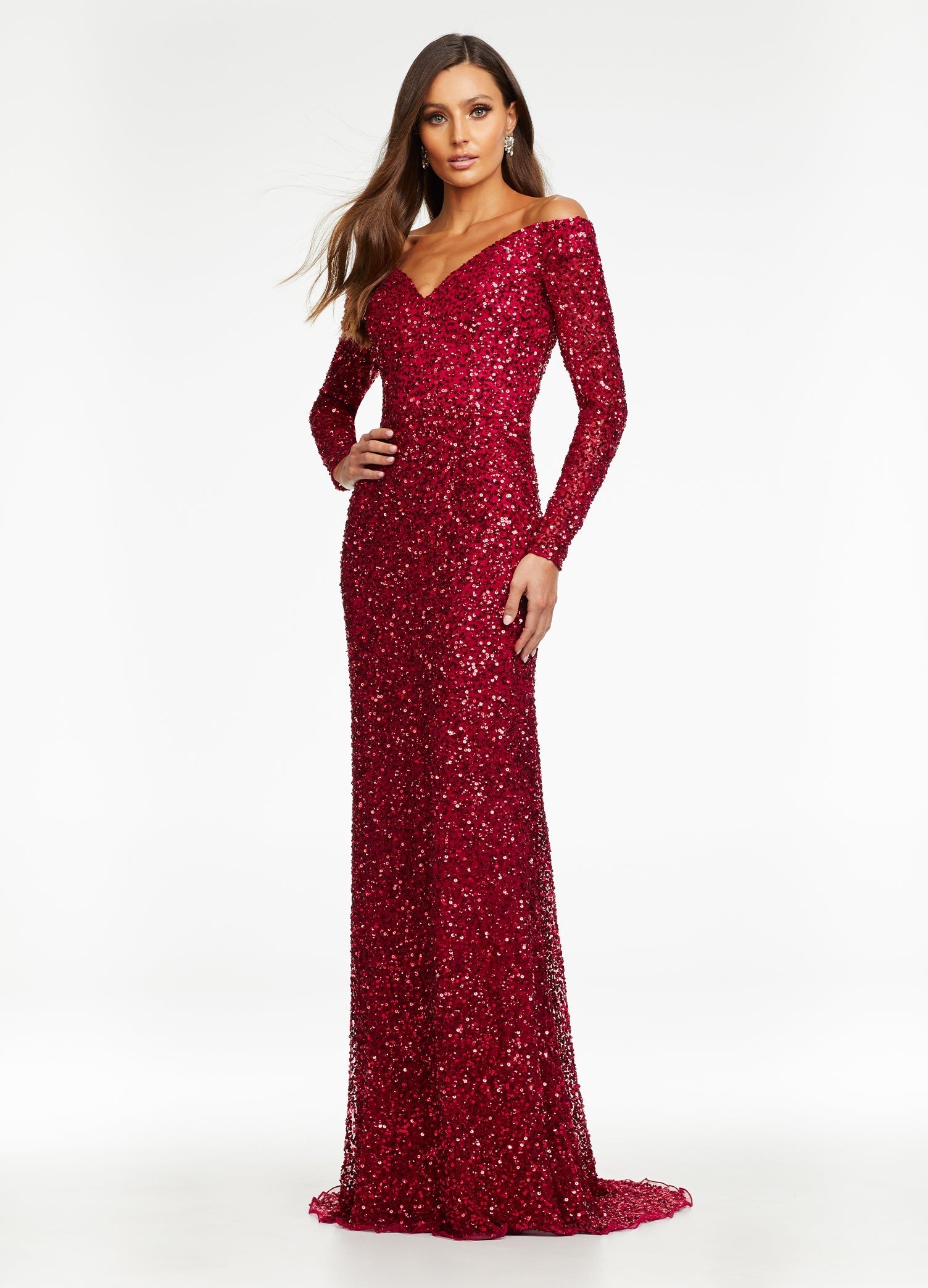 Ruby Red ASHLEYlauren 11176 off shoulder sequin gown featuring long sleeves, a fitted silhouette, an inner corset for added structure, and a sweeping train for a dramatic and glamorous look.