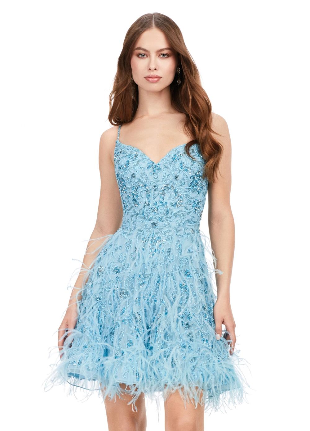 Sky ASHLEYlauren 4604 – A fabulous cocktail dress featuring intricate beading throughout, a sweetheart neckline, spaghetti straps, and an A-line skirt adorned with feather details. Perfect for turning heads on the dance floor or stage.