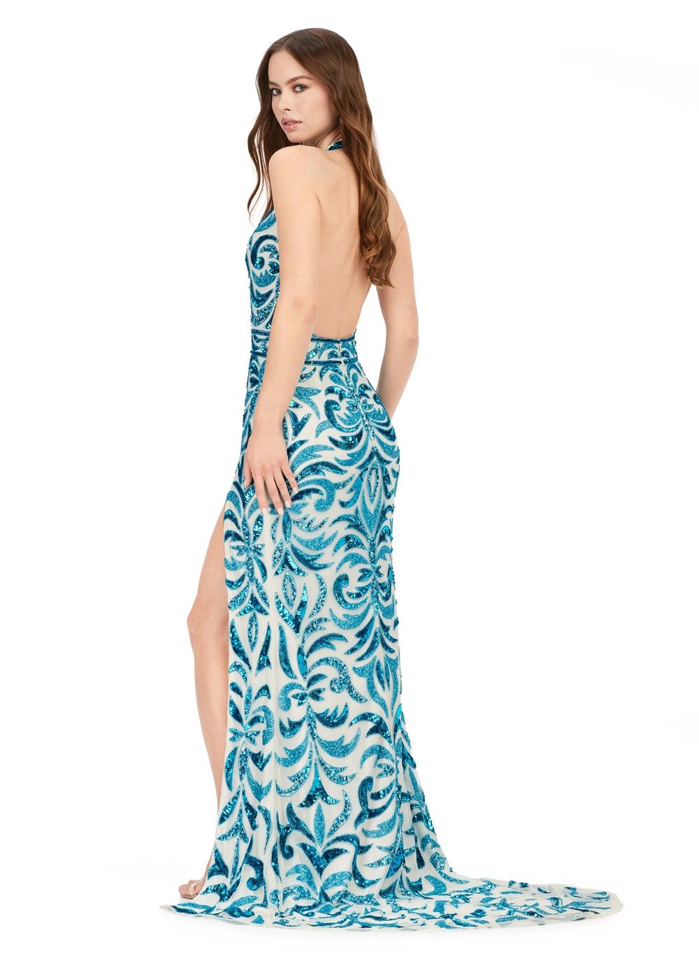 Back - Turquoise/Ivory ASHLEYlauren 11283 halter gown featuring a V-neckline, open back, intricate beading throughout, and a left leg slit.