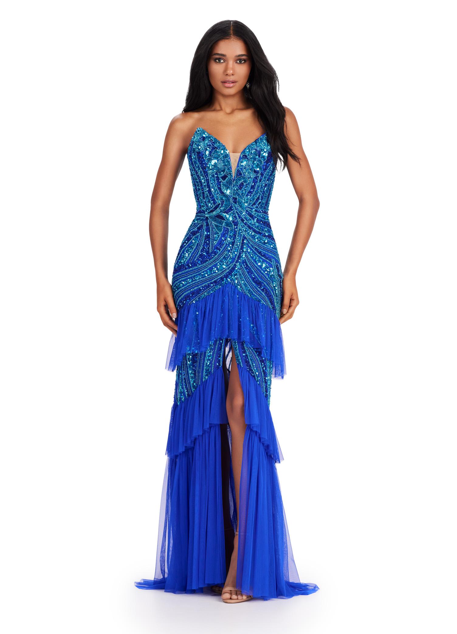 Turquoise/Royal ASHLEYlauren 11438 glamorous gown featuring a sweetheart illusion V-neckline, ornate bead pattern, striking V-back, tiered ruffle skirt, and a center slit with tulle details for an elegant and dramatic look.