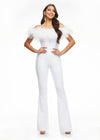 ASHLEYlauren 11100 – A flirty off-shoulder scuba jumpsuit featuring feather details along the neckline and flare pant legs. Perfect for making a stylish statement at your next event.