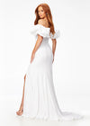 Back - White ASHLEYlauren 11217 – A magnificent off-shoulder velvet gown featuring oversized ruffle details, a contour seamed skirt with a left leg slit, and a dramatic train. Perfect for making a bold, elegant statement at any event.