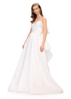 White ASHLEYlauren 11769 stunning satin gown featuring a sweetheart neckline adorned with crystal details, ruched wrap bodice, dramatic oversized bow, and an A-line ball gown skirt for a glamorous and elegant look.