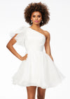 White ASHLEYlauren 4524 organza cocktail dress featuring a one shoulder neckline with a flutter sleeve, an A-line skirt with a wire hem for added structure, and a playful, sassy vibe.