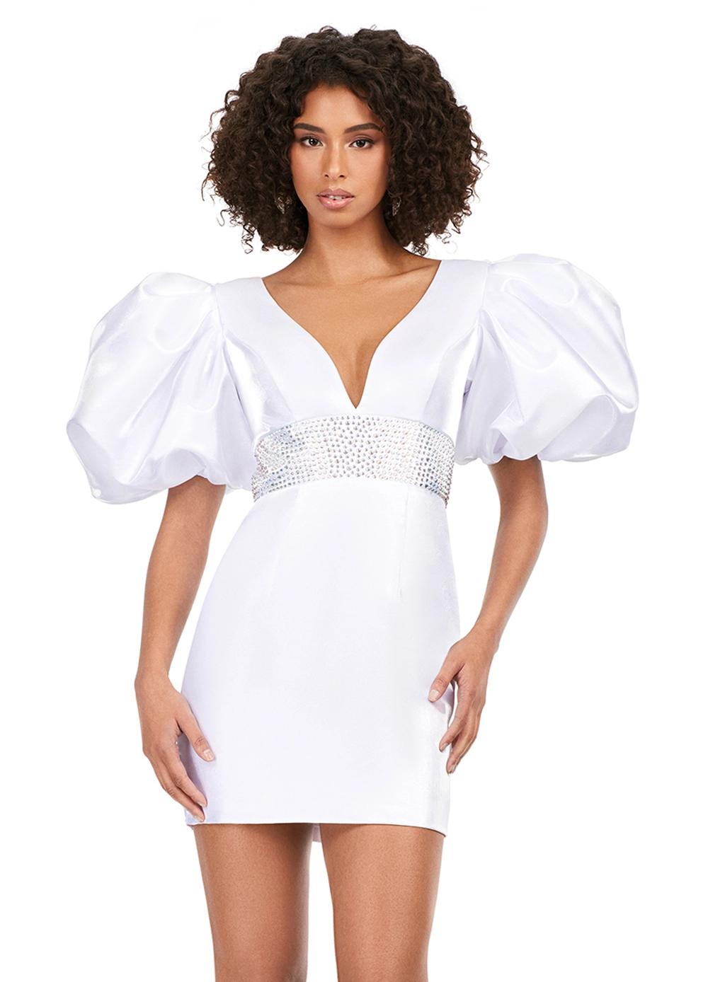 White ASHLEYlauren 4549 cocktail dress featuring a V-neckline, oversized puff sleeves, heat set stone-embellished waistband, fitted skirt, and center lace-up back for a bold and glamorous look.