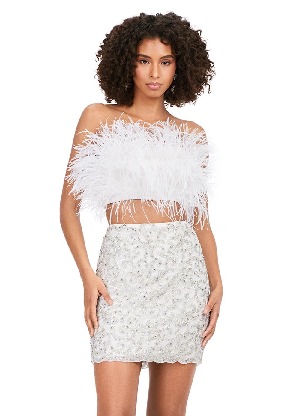 White ASHLEYlauren 4599 – A stunning two-piece set featuring a strapless feather bustier and a fully beaded fitted skirt. This gorgeous, statement-making outfit is a must-have addition to your closet.