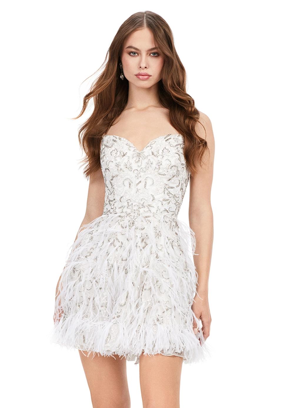 White ASHLEYlauren 4604 – A fabulous cocktail dress featuring intricate beading throughout, a sweetheart neckline, spaghetti straps, and an A-line skirt adorned with feather details. Perfect for turning heads on the dance floor or stage.