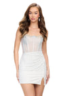 White ASHLEYlauren 4690 stunning cocktail dress featuring an illusion neckline, corset bustier with press-on stones cascading down the skirt, and a wrap skirt with a side slit for an elegant and head-turning look.