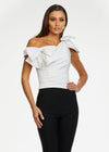 White ASHLEYlauren 9001 elegant one shoulder bustier featuring asymmetrical ruching and delicate bow accents, perfect for styling with jeans or for pageant headshots.