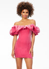 Pink ASHLEYlauren 4528 off shoulder stretch velvet cocktail dress featuring an oversized ruffle detail and contoured seaming throughout the fitted skirt for a chic, curve-enhancing look.