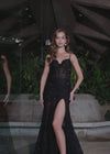 Video - Elegant tulle gown featuring delicate spaghetti straps, a sweetheart neckline, and intricate embroidered appliqué that cascades down the skirt. Complete with a left leg slit and sweep train for a romantic and glamorous look. Perfect for special occasions.