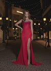 Video - Breathtaking strapless gown featuring a beaded corset bustier, a press-on stone embellished skirt, a left leg slit, and a sweep train for an elegant and glamorous finish. Perfect for special occasions.