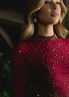 Video Red ASHLEYlauren 4736 fitted cocktail dress featuring a high neckline, illusion long sleeves, press-on heat set stones accentuating the collar, cuffs, and waistline for a glamorous and curve-enhancing look.