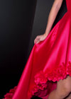 Video - : Fun and flirty high-low dress featuring a strapless bustier, elegant 3D floral trim, and a sleek mikado finish for a chic and stylish look. Perfect for special occasions.
