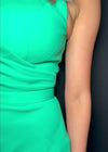 Video - Green ASHLEYlauren 4678 scuba cocktail dress featuring a one sleeve design, ruched bustier, fitted silhouette, and a matching scuba belt for a chic and sophisticated look.