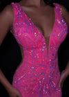 Video - Pink ASHLEYlauren 4790 fully hand-beaded cocktail dress featuring a V-neckline, V-back, illusion side cut outs, and a fitted silhouette for a glamorous and show-stopping look.