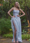 Video -  Ice Blue ASHLEYlauren 11313 strapless satin gown featuring a ruched bustier, slight A-line skirt, high right leg slit, and cascading feather trim along the hemline.