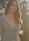 Video - ASHLEYlauren 11234 Elegant Fully Beaded Gown with V-Neckline, Wrap Style Bustier, and Sheer Ruffled Puff Mesh Sleeves