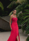 Video - Red ASHLEYlauren 11664 fitted jersey gown featuring a fully beaded corset bustier, spaghetti straps, lace-up back, ruched waist detailing, and a left leg slit for a sleek and glamorous look.