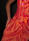 Video - Close-up. Red/Coral ASHLEYlauren 11236 strapless gown featuring a sweetheart neckline, modern floral sequin motif cascading down the bustier and skirt, and a left leg slit for a glamorous and head-turning look.