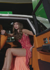 Video - Red/Coral ASHLEYlauren 11236 strapless gown featuring a sweetheart neckline, modern floral sequin motif cascading down the bustier and skirt, and a left leg slit for a glamorous and head-turning look.