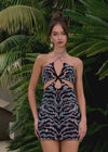 Video - Black ASHLEYlauren 4726 cocktail dress featuring animal print-inspired beadwork, a halter neckline, illusion cut outs, press-on stones, and a fitted skirt for a bold and glamorous look.