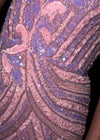 Video -Lilac/Pink ASHLEYlauren 4500 strapless gown featuring a plunging V-neckline, ornate sequin bead pattern, and striking V-back for a bold and glamorous look.
