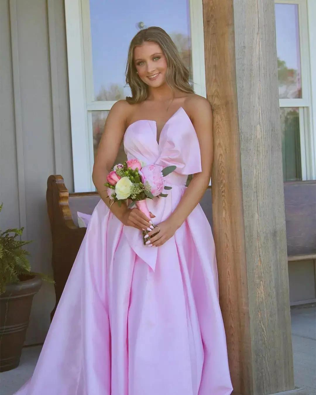 girl at prom in pink dress
