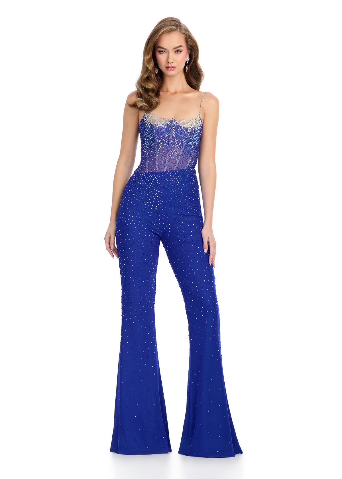Glamorous corset jumpsuit featuring a structured bustier with spaghetti straps, dazzling press-on stones, flared bottoms, and a stunning sheer back. The perfect blend of elegance and versatility for any occasion.