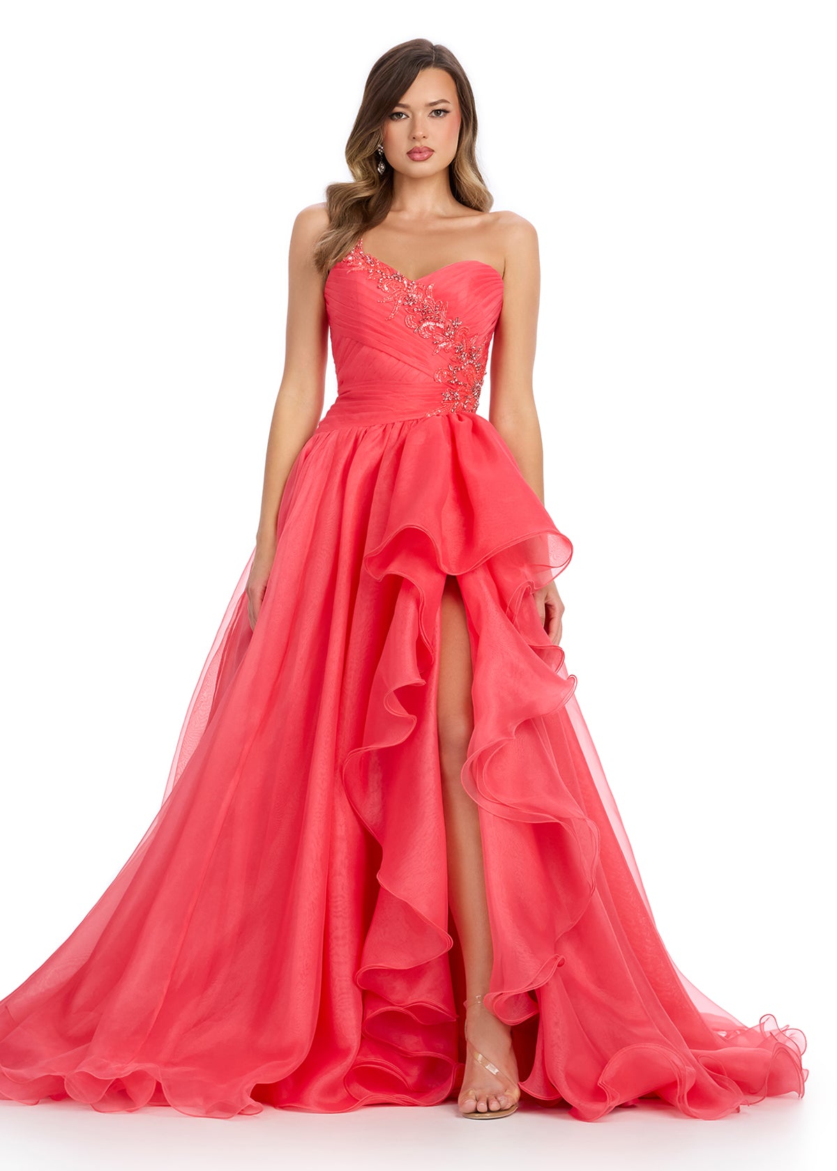  Princess-worthy organza ball gown featuring a sweetheart neckline, intricate beaded details on the bodice and one-shoulder strap, and cascading ruffles that enhance the left leg slit for an elegant and regal look. Perfect for special occasions.