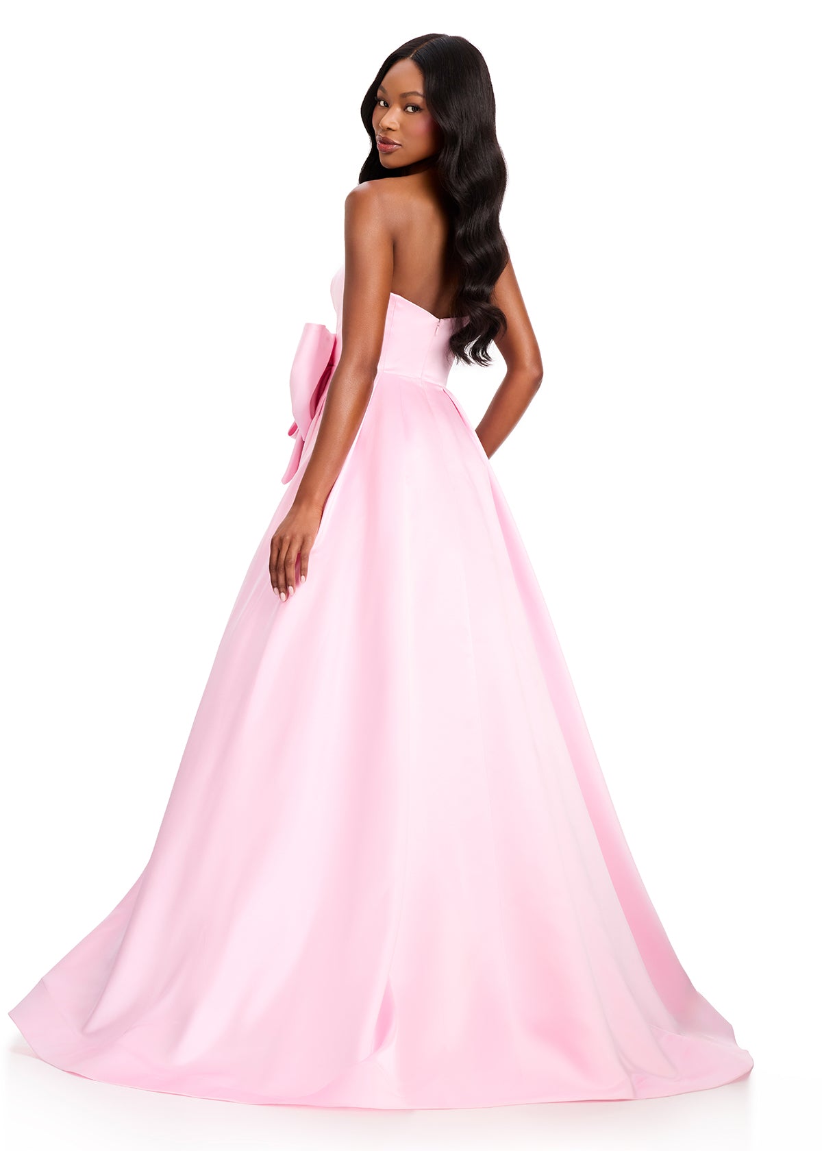ASHLEYlauren 12396 Gown | Ice Pink evening gown with a sculpted strapless bodice, oversized bow accent, and dramatic full train for elegant finish