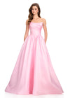 ASHLEYlauren 12399 Gown | Ice Pink satin ball gown featuring a soft draped off-the-shoulder neckline, corset-inspired bodice, and a dramatic full skirt