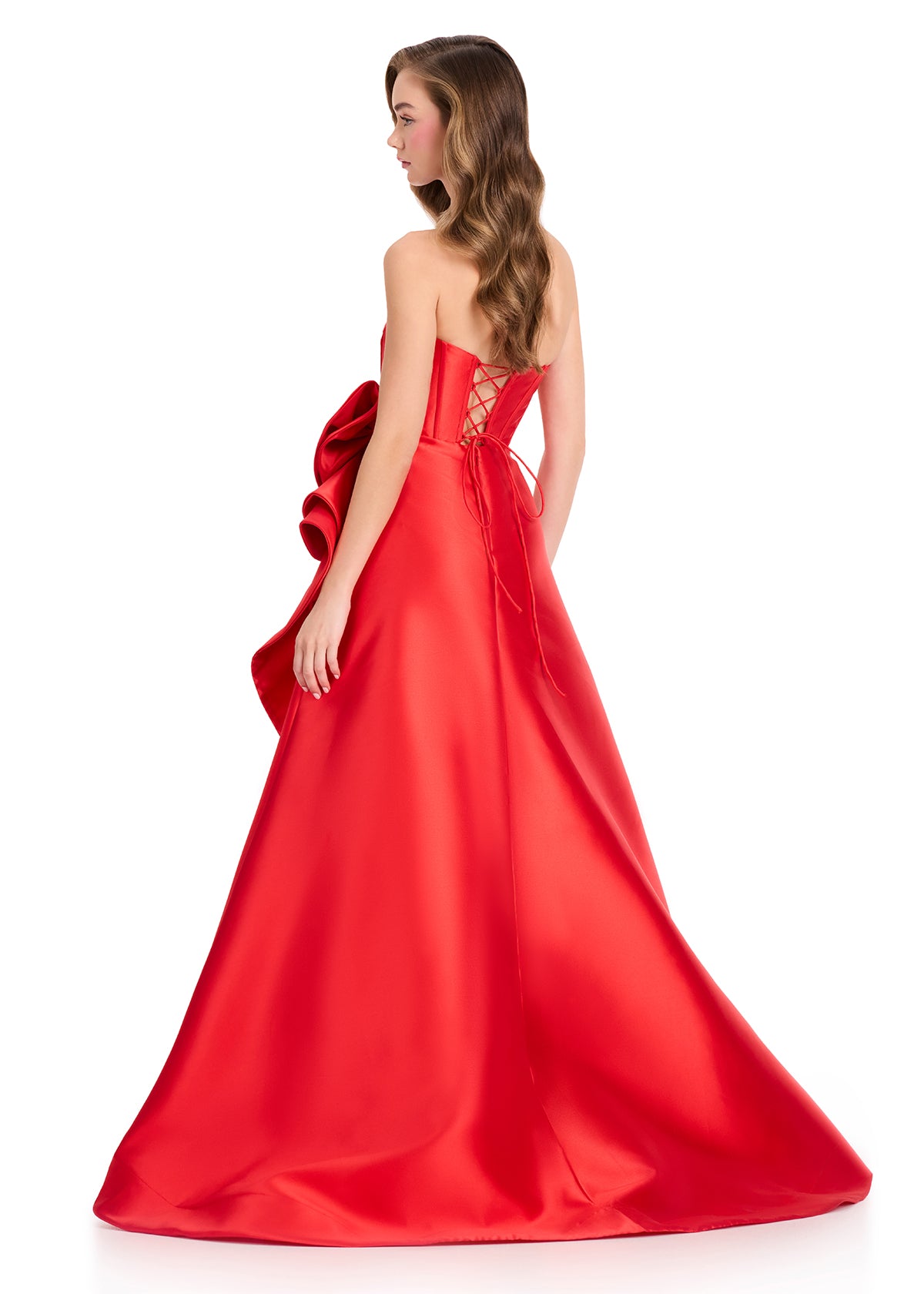 ASHLEYlauren 12402 Gown | Full length strapless gown with corset back and a bow embellishment with ruffles