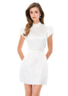 ASHLEYlauren 4969 | Ivory structured satin mini featuring short puff sleeves, pleated skirt, and dramatic open back bow