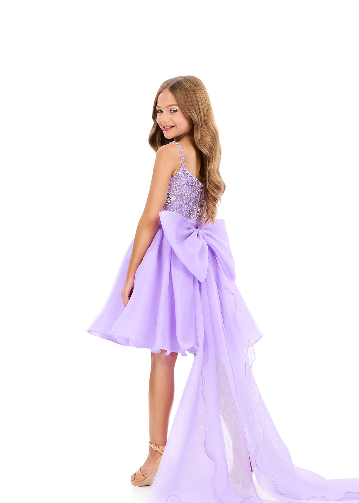 ASHLEYlauren 8369 | Orchid pageant dress with beaded bodice, high-low skirt, and dramatic bow train