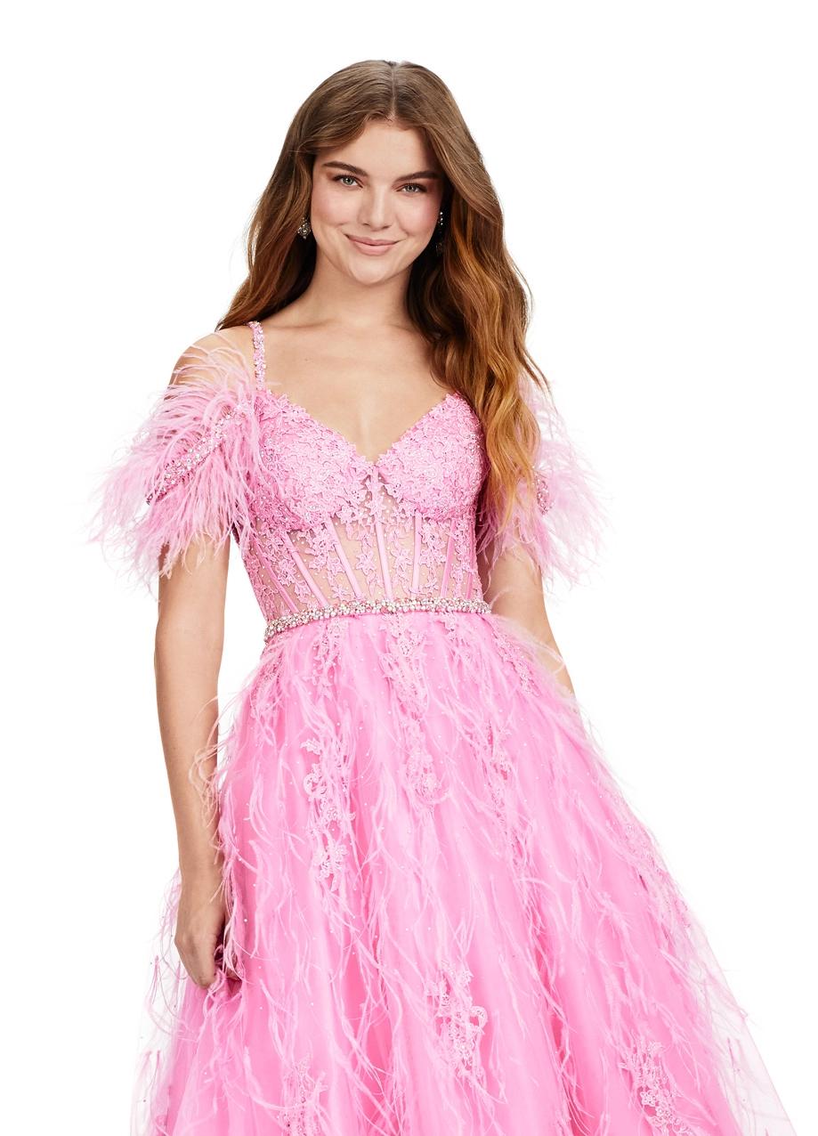 ASHLEYlauren 11447 pink A-line gown with beaded corset bustier, feather off shoulder straps, exposed boning, and lace appliqué