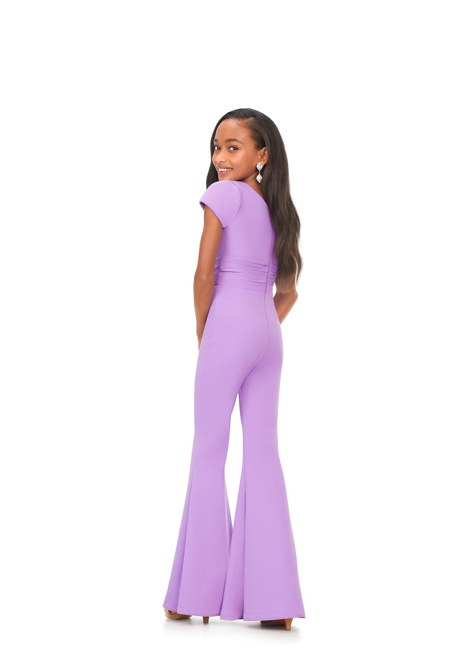 Back. Lilac ASHLEYlauren Kids 8157 stylish scuba jumpsuit featuring a crew neckline, cap sleeves, ruched waist detail, and flare pants for a polished and elegant look.