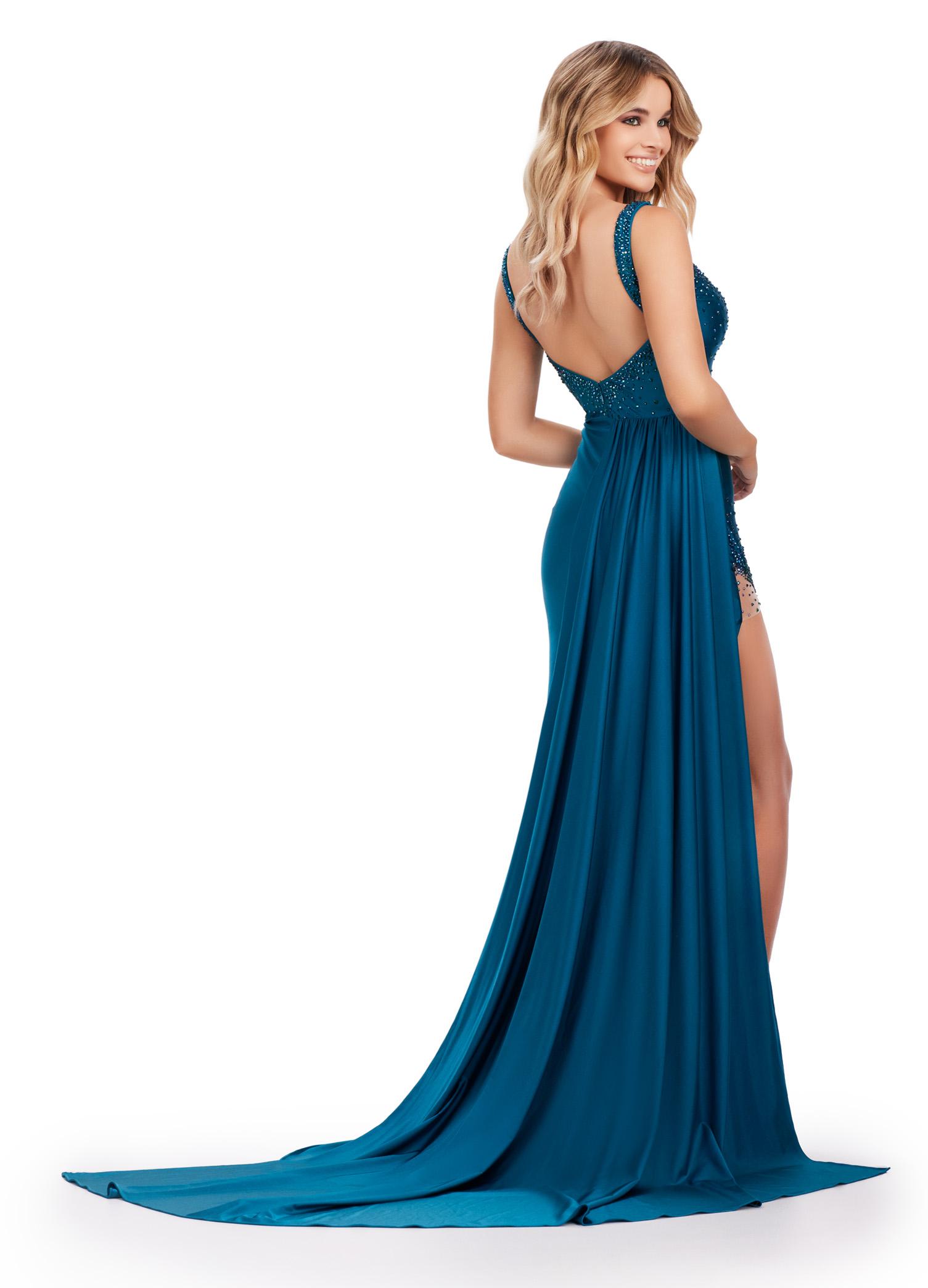 Back. Peacock ASHLEYlauren 11579 Unique Jersey Gown with Illusion V-Neckline, Sparkling Press On Stones, Flowing Side Skirt, and Left Leg Slit