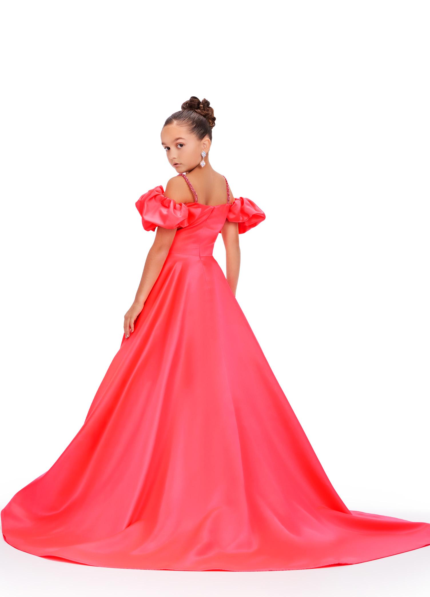 Back - ASHLEYlauren 8256 watermelon satin kids ball gown featuring an off-shoulder neckline, dramatic puff sleeves, beaded spaghetti straps, and a full A-line skirt for a charming and elegant look.