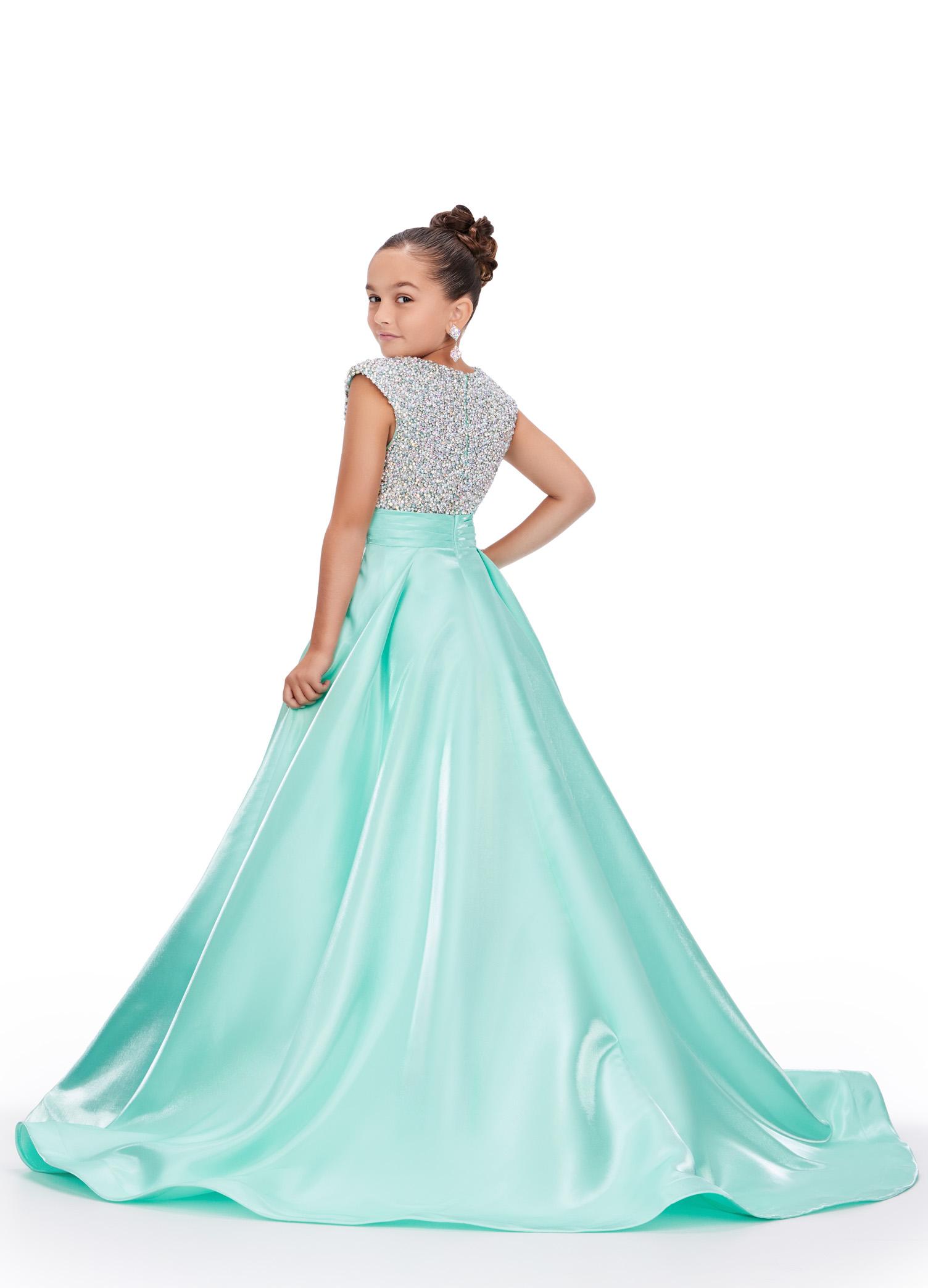 Back - Aqua ASHLEYlauren 8247 adorable kids ball gown featuring a fully embellished cap sleeve bodice, ruched waistline, and a full satin skirt accented with a bow for a charming and elegant look.