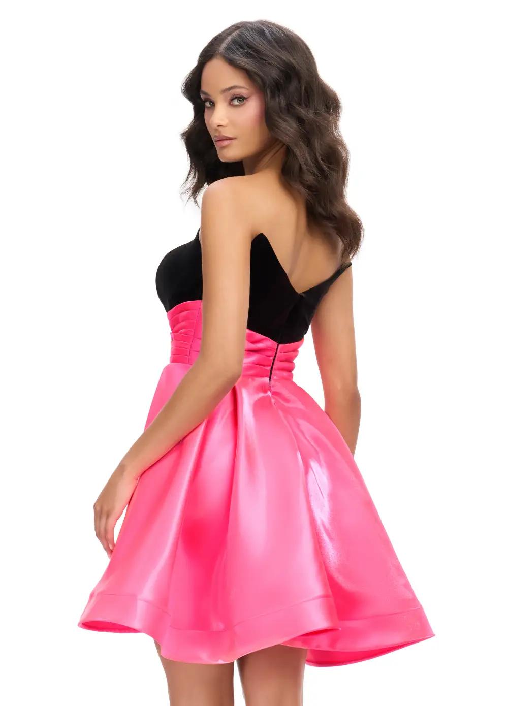 Back -  Black/Pink ASHLEYlauren 4734 strapless stretch velvet cocktail dress featuring a fitted skirt, satin wrap belt, and an A-line satin overskirt for an elegant and sophisticated look.
