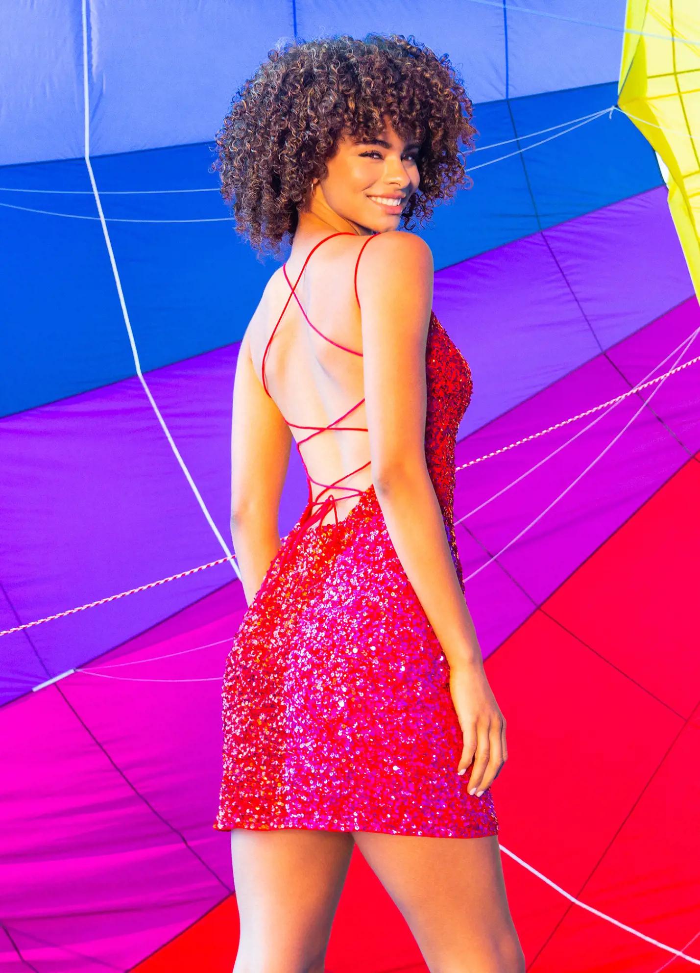 Back - Fuchsia/Red ASHLEYlauren 4502 fully sequin color block gown featuring delicate spaghetti straps, a multi-colored lace-up back, and a left leg slit for a bold and stylish finish.