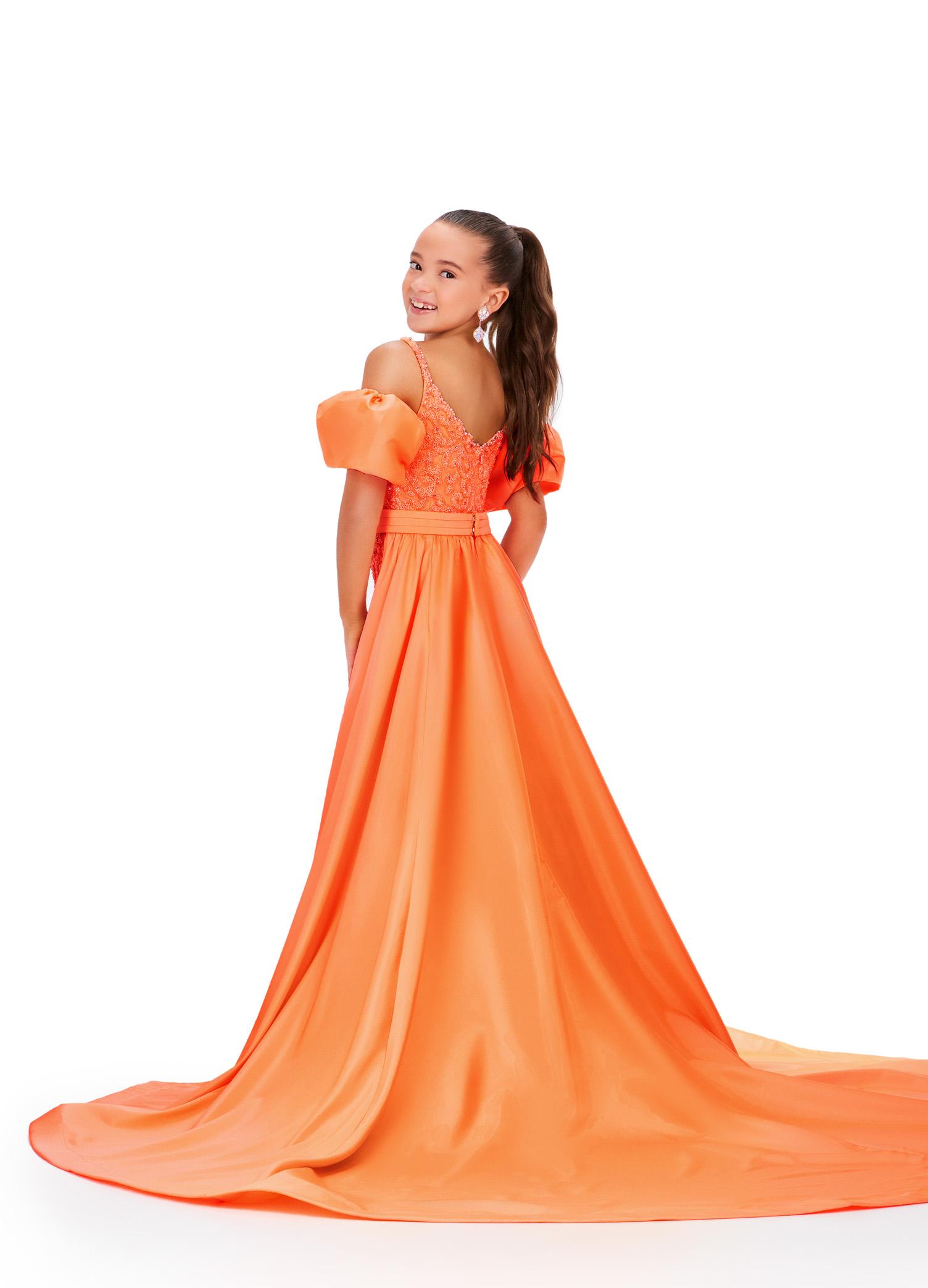 Back - Orange ASHLEYlauren 8269 fully beaded kids jumpsuit featuring a square neckline, dramatic removable taffeta puff sleeves, and a detachable taffeta overskirt for a bold and versatile statement look.